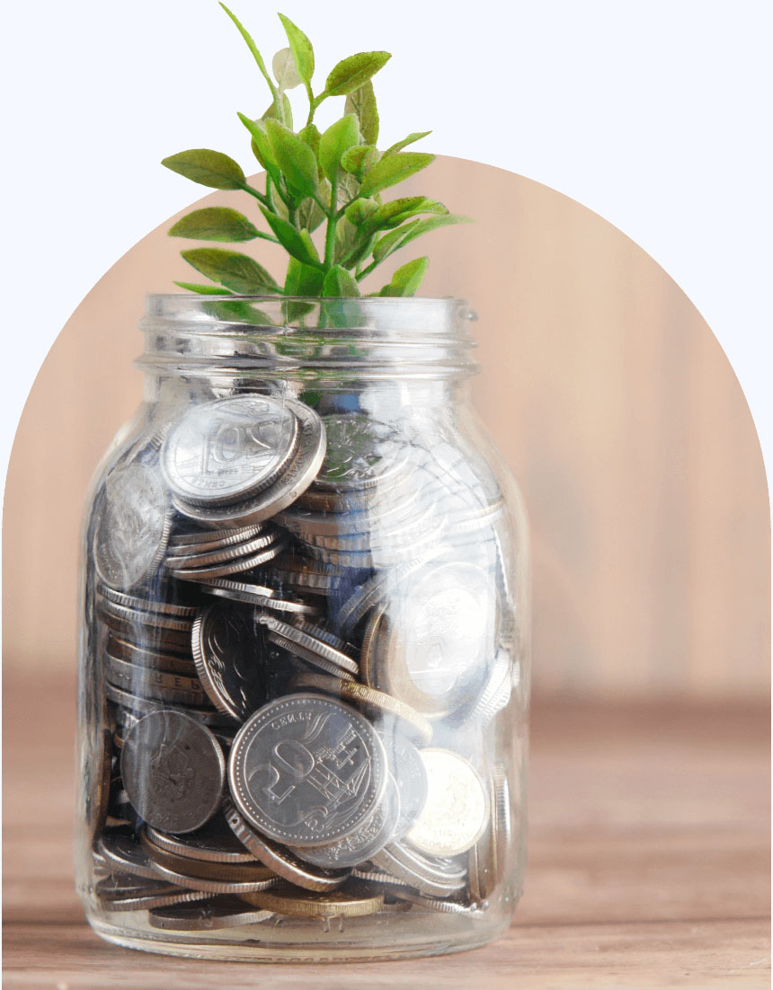 Image of coin jar with plant growing out of the top.