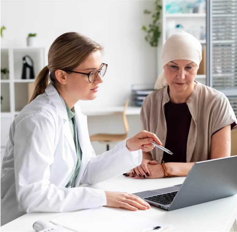 Photo of cancer patient consulting with doctor in home